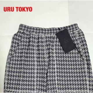 ウル(URU)の【新品】URU TOKYO　ウル　総柄パンツ　千鳥格子柄　個性的　美品　タグ付き(その他)