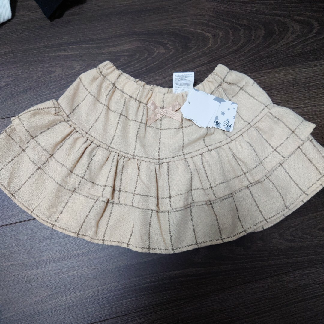 西松屋(ニシマツヤ)の★新品未使用★ベージュ チェック スカート キッズ/ベビー/マタニティのキッズ服女の子用(90cm~)(スカート)の商品写真