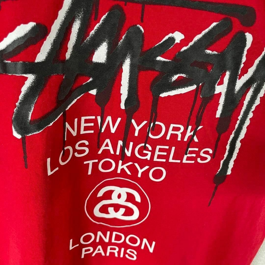 【人気ワールドツアーロゴ】stussy両面プリントレッド赤ストリートM半袖