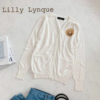 リリーリン(Lilly Lynque)の美品　リリーリン　Lilly Lynque　ニコちゃん　Vネック　カーディガン(カーディガン)