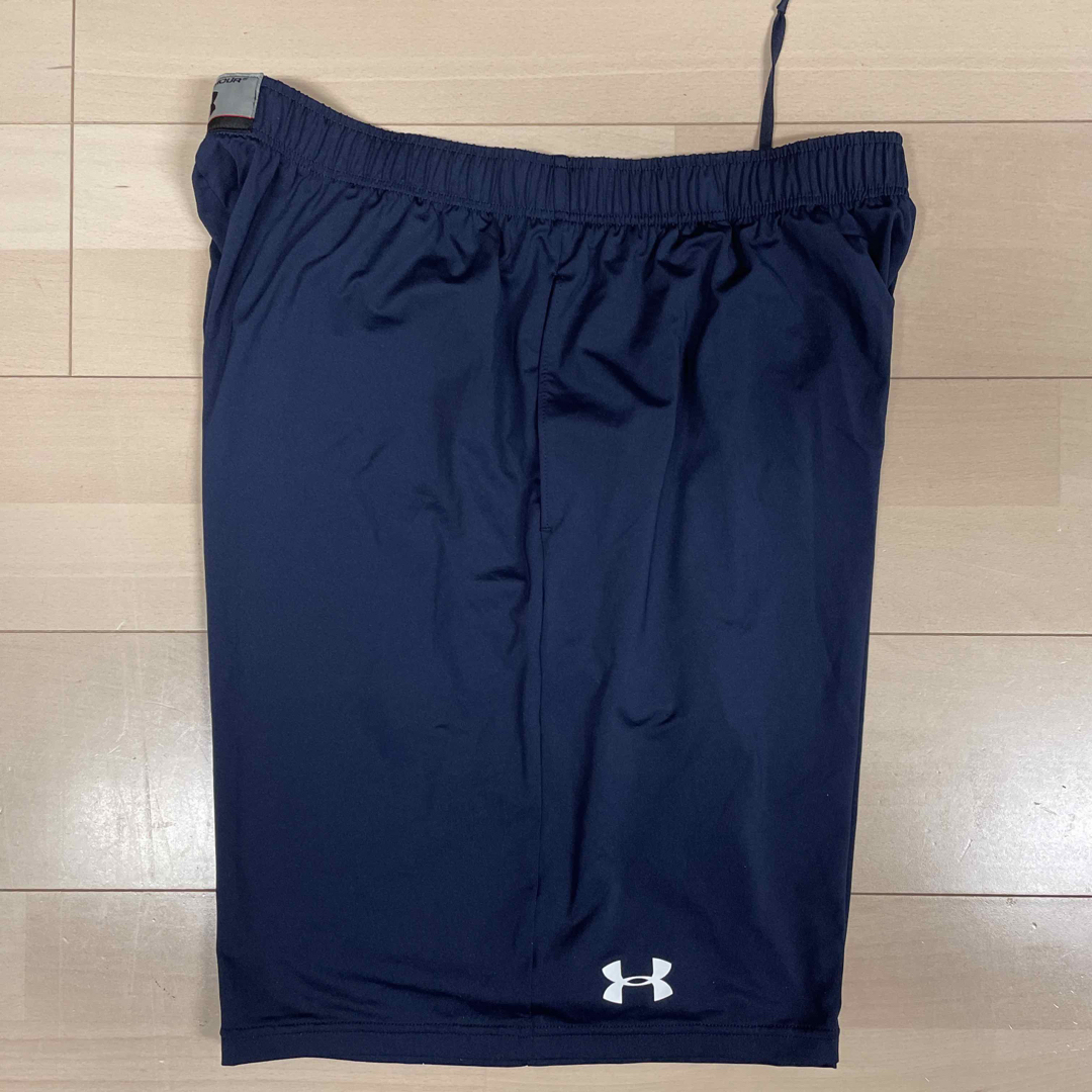 UNDER ARMOUR(アンダーアーマー)の法政大学“ORANGE“トレーニングハーフパンツ XXLサイズ【選手限定非売品】 スポーツ/アウトドアのスポーツ/アウトドア その他(アメリカンフットボール)の商品写真