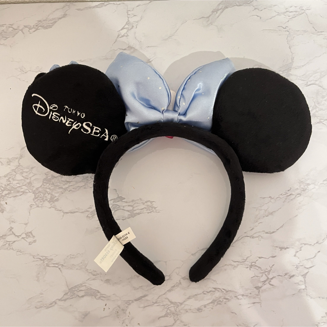 Disney(ディズニー)のDisney ディズニー カチューシャ ミニー シー限定 リボン 水色 レディースのヘアアクセサリー(カチューシャ)の商品写真