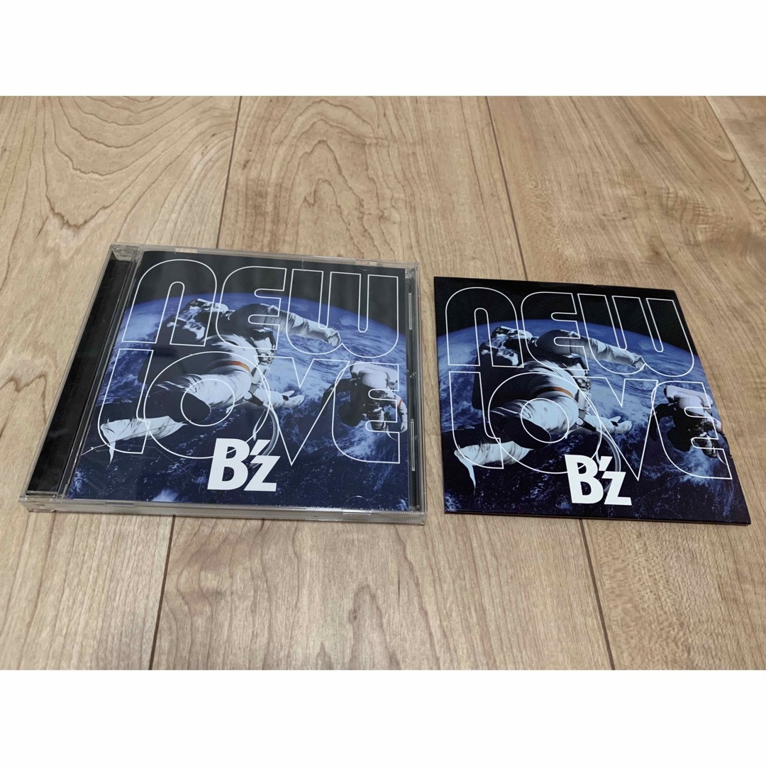 B'z(ビーズ)のB’z NEWLOVE CD + 楽天ブックス特典コースター 2点セット エンタメ/ホビーのCD(ポップス/ロック(邦楽))の商品写真