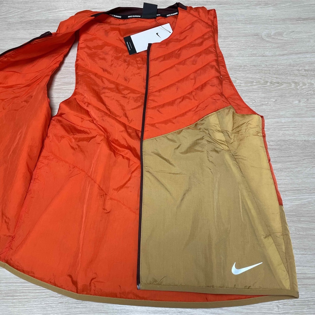 NIKE(ナイキ)の新品★NIKE★定価12100円★ランニングベスト★XLサイズ メンズのジャケット/アウター(ダウンベスト)の商品写真