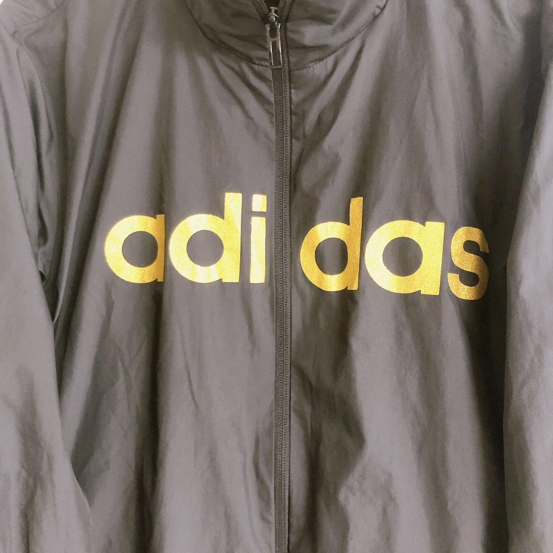 adidas(アディダス)の美品　アディダス　ナイロンジャケット　ビックロゴ　ゴールド レディースのジャケット/アウター(ナイロンジャケット)の商品写真