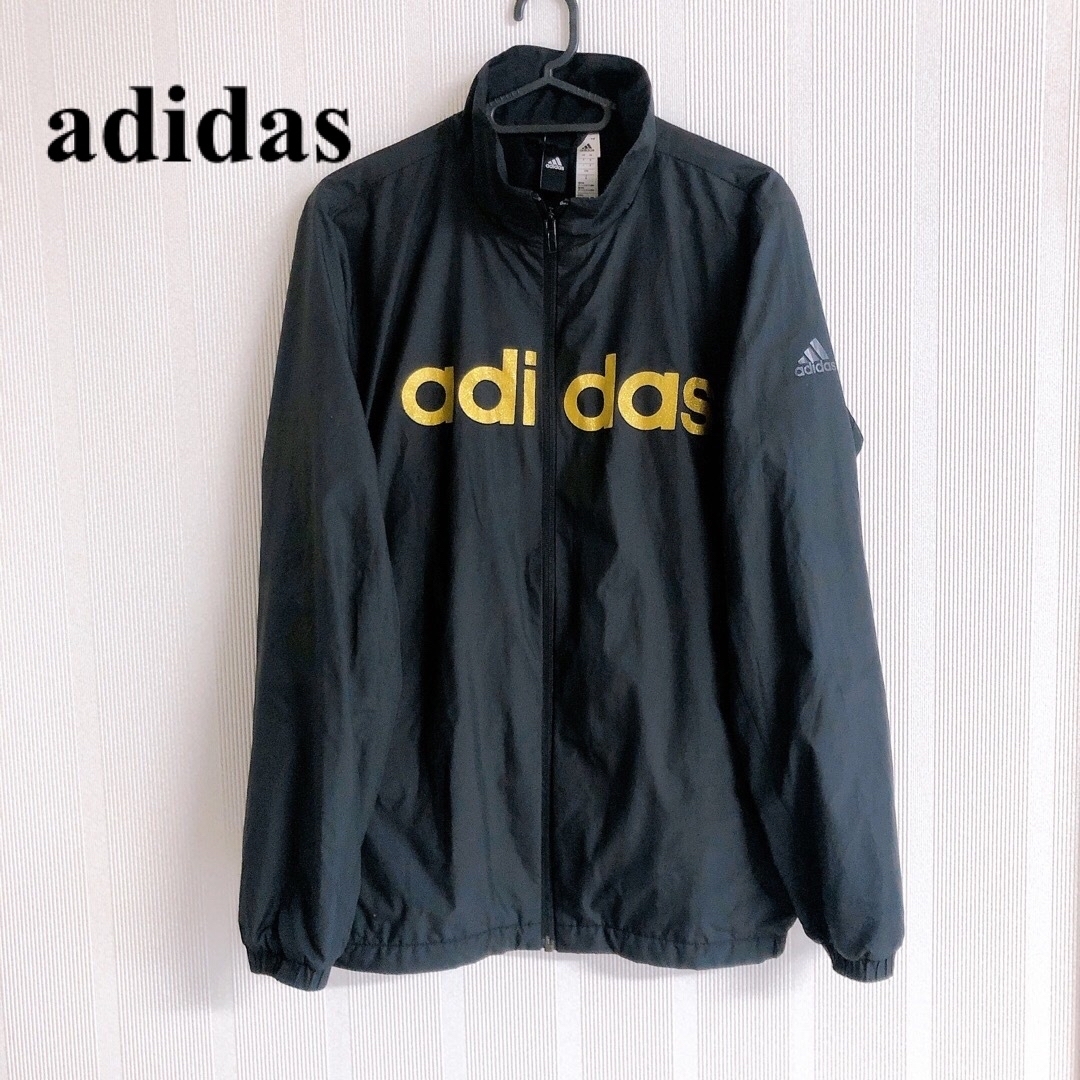 adidas(アディダス)の美品　アディダス　ナイロンジャケット　ビックロゴ　ゴールド レディースのジャケット/アウター(ナイロンジャケット)の商品写真