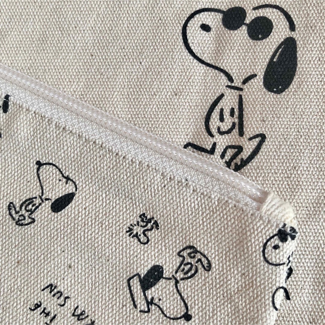 SNOOPY(スヌーピー)の新品タグ付　ユニクロ×ピーナツ×長場雄　ポーチセット エンタメ/ホビーのおもちゃ/ぬいぐるみ(キャラクターグッズ)の商品写真