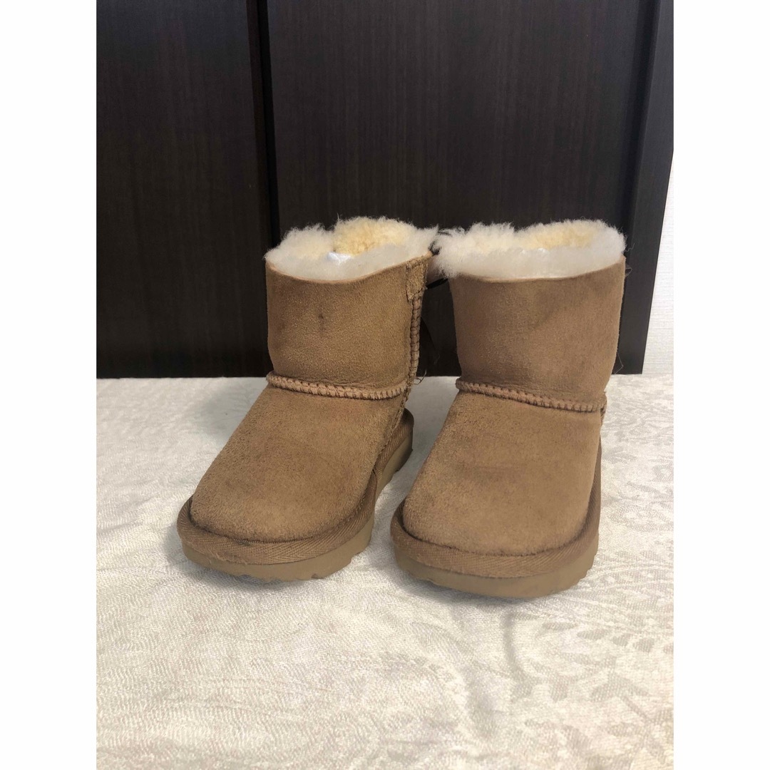 UGG(アグ)のUGG ムートンブーツ リボン 14.5cm キッズ/ベビー/マタニティのベビー靴/シューズ(~14cm)(ブーツ)の商品写真