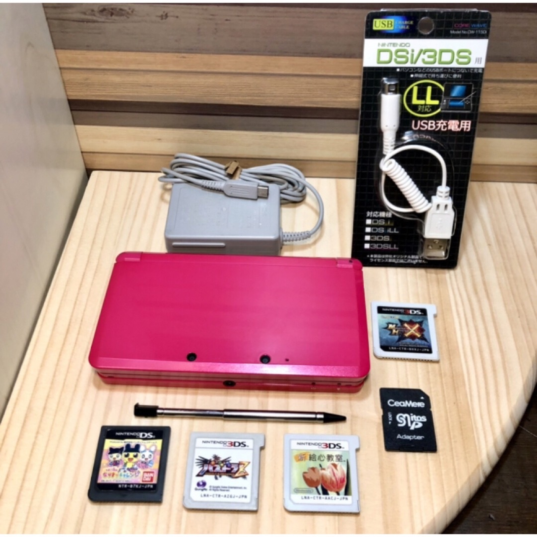 ニンテンドー3DS(ニンテンドー3DS)のニンテンドー　3ds  グロスピンク　美品　ソフトたくさん付き　16GBメモリ付 エンタメ/ホビーのゲームソフト/ゲーム機本体(携帯用ゲーム機本体)の商品写真