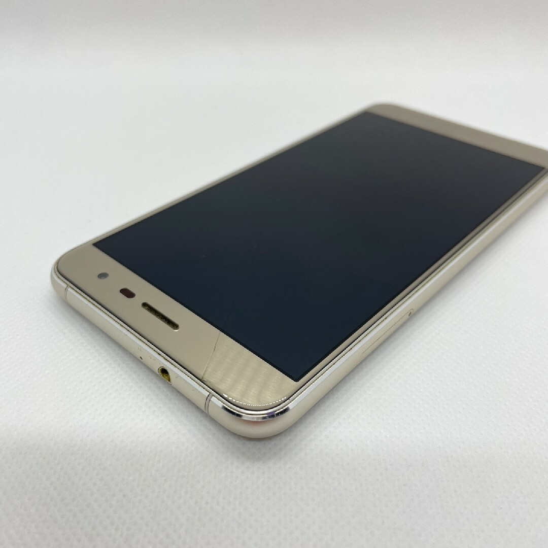 ASUS(エイスース)の中古スマホ ASUS ZenFone 3 ZE552KL クリスタルゴールド スマホ/家電/カメラのスマートフォン/携帯電話(スマートフォン本体)の商品写真