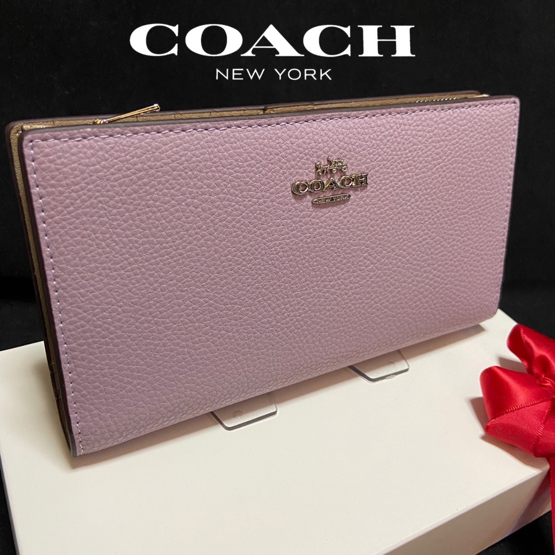 COACH(コーチ)のギフト⭕️ コーチ スリムで大容量！本革ラベンダー色 二つ折 長財布 レディースのファッション小物(財布)の商品写真
