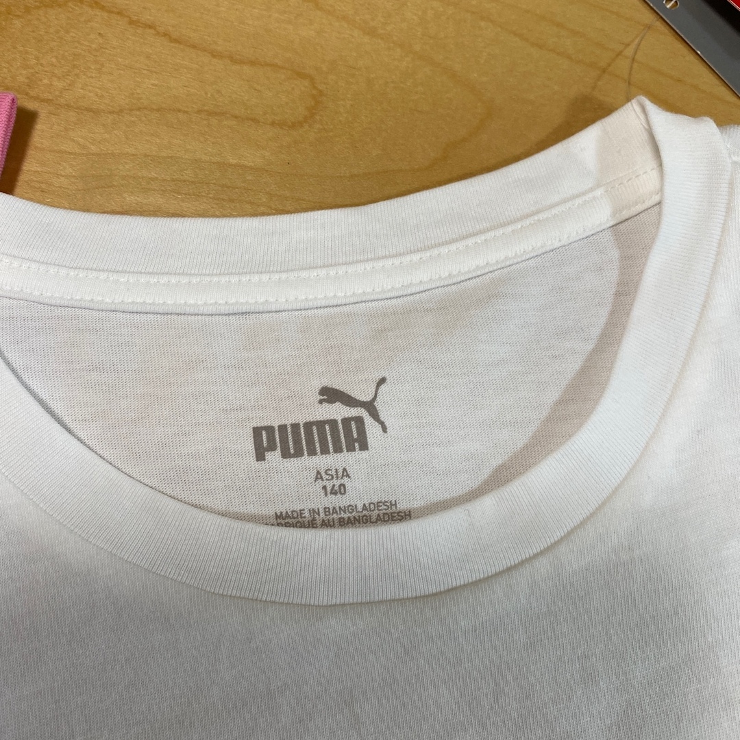 PUMA(プーマ)の新品　プーマ　アンダーアーマー　半袖　Ｔシャツ　140  ホワイト　ピンク キッズ/ベビー/マタニティのキッズ服女の子用(90cm~)(Tシャツ/カットソー)の商品写真