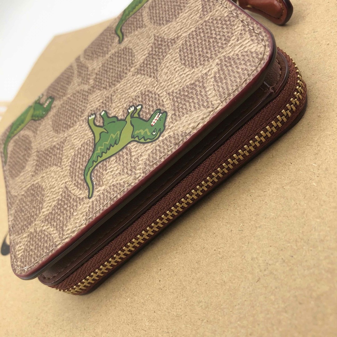COACH☆新作】ビルフォールド ウォレット シグネチャー レキシー