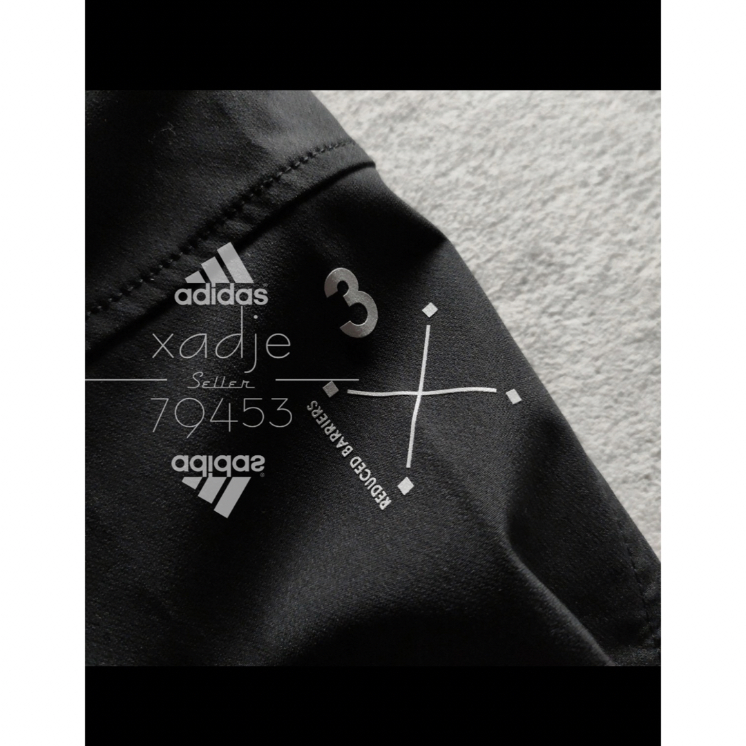 adidas(アディダス)の adidas ナイロンパンツ 6ポケット カーゴパンツ黒 ストレッチ有り XL メンズのパンツ(ワークパンツ/カーゴパンツ)の商品写真