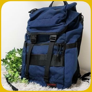 ブリーフィング(BRIEFING)の美品 BRIEFING トゥモローランド 別注 FLAP PACK USA 青(バッグパック/リュック)