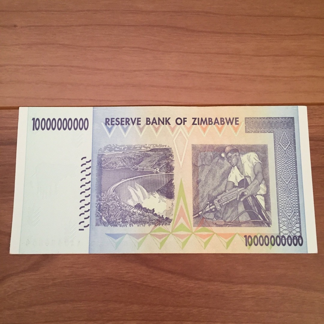 限定専用冊子ケース 完全未使用級 ジンバブエドル紙幣 ジンバブエ紙幣 2連番