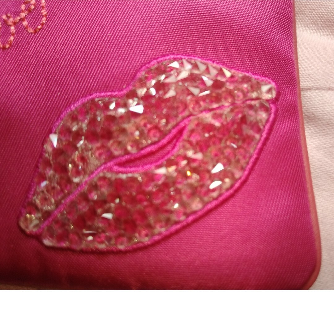 SWAROVSKI(スワロフスキー)のスワロフスキーのショッキングピンク色のポーチ新品 レディースのファッション小物(ポーチ)の商品写真