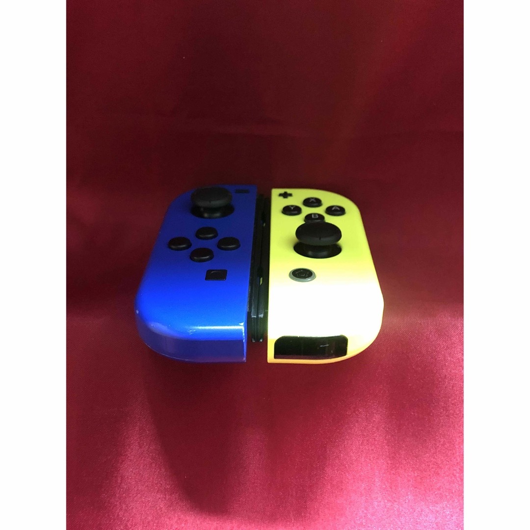 Nintendo Switch(ニンテンドースイッチ)の[安心保証]純正ジョイコン　ブルー Ｌ　ネオンイエロー Ｒ　箱、ストラップ付き エンタメ/ホビーのゲームソフト/ゲーム機本体(その他)の商品写真