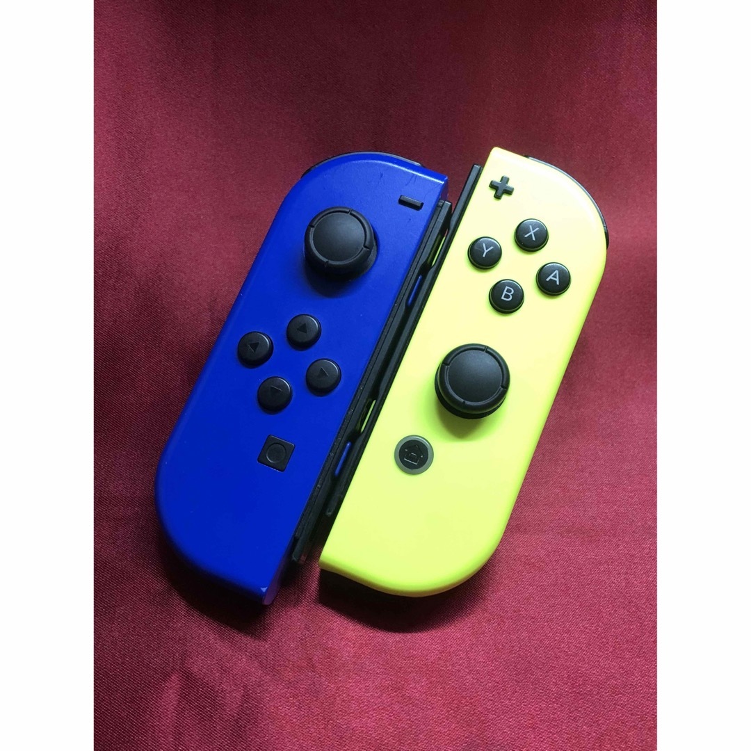 Nintendo Switch(ニンテンドースイッチ)の[安心保証]純正ジョイコン　ブルー Ｌ　ネオンイエロー Ｒ　箱、ストラップ付き エンタメ/ホビーのゲームソフト/ゲーム機本体(その他)の商品写真