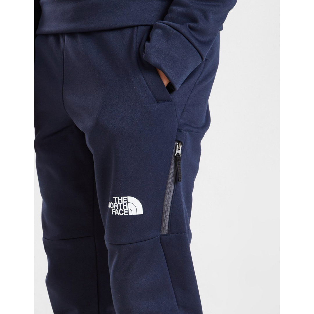 THE NORTH FACE(ザノースフェイス)の【海外限定】TNF ジョガーパンツ メンズ　ジュニア　ネイビー　 170 メンズのパンツ(その他)の商品写真