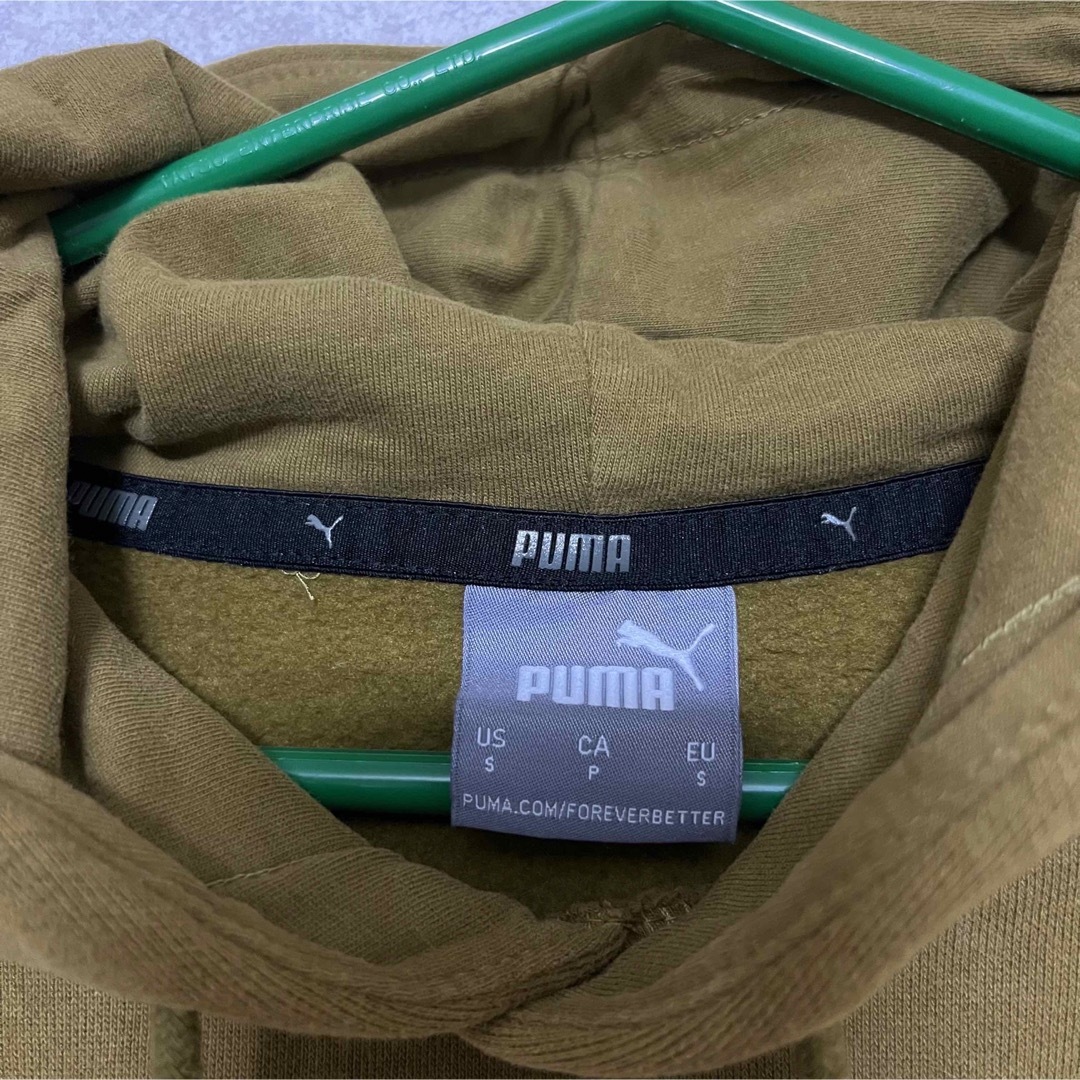 PUMA(プーマ)のPUMA スウェット パーカー ゴールド S レディースのトップス(パーカー)の商品写真