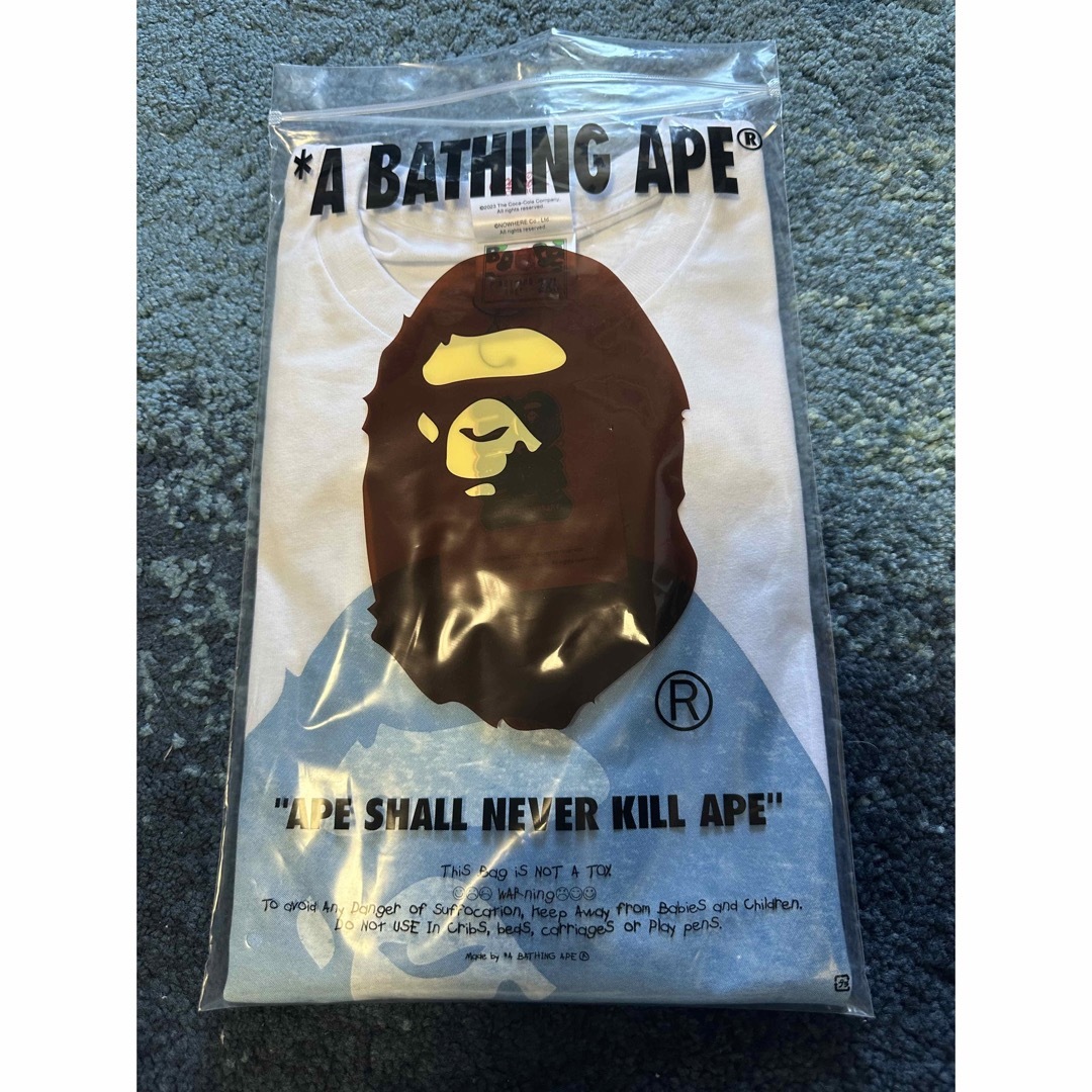 A BATHING APE(アベイシングエイプ)の【 BAPE X Coca-Cola 】PHOTO APE HEAD TEE メンズのトップス(Tシャツ/カットソー(半袖/袖なし))の商品写真