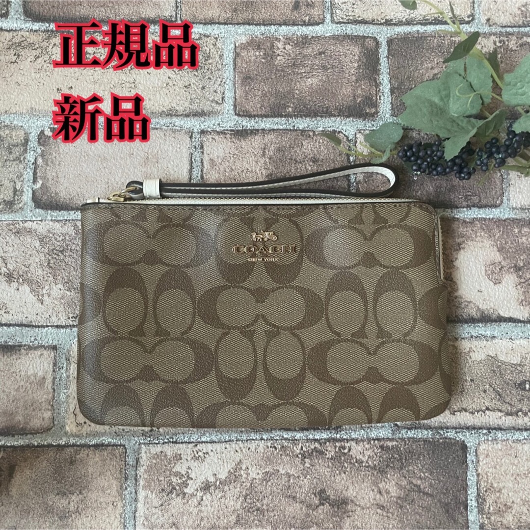 新品,大特価!】 新品 COACH コーチ ポーチ カーキサドル ポーチ