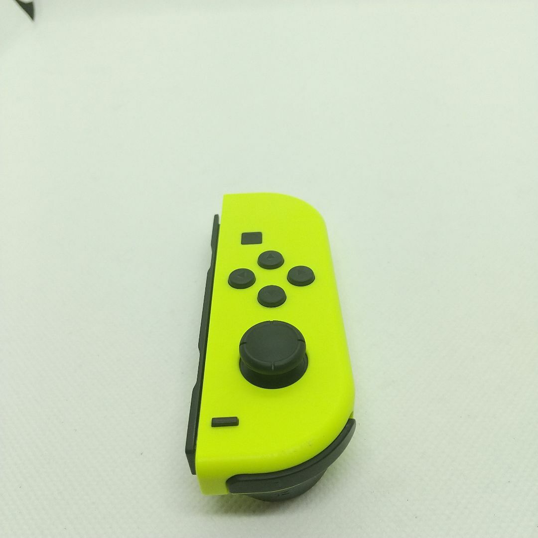 Nintendo Switch(ニンテンドースイッチ)の【希少】⑨Switch ジョイコン　ネオンイエロー左のみ(L)【任天堂純正品】黄 エンタメ/ホビーのゲームソフト/ゲーム機本体(家庭用ゲーム機本体)の商品写真