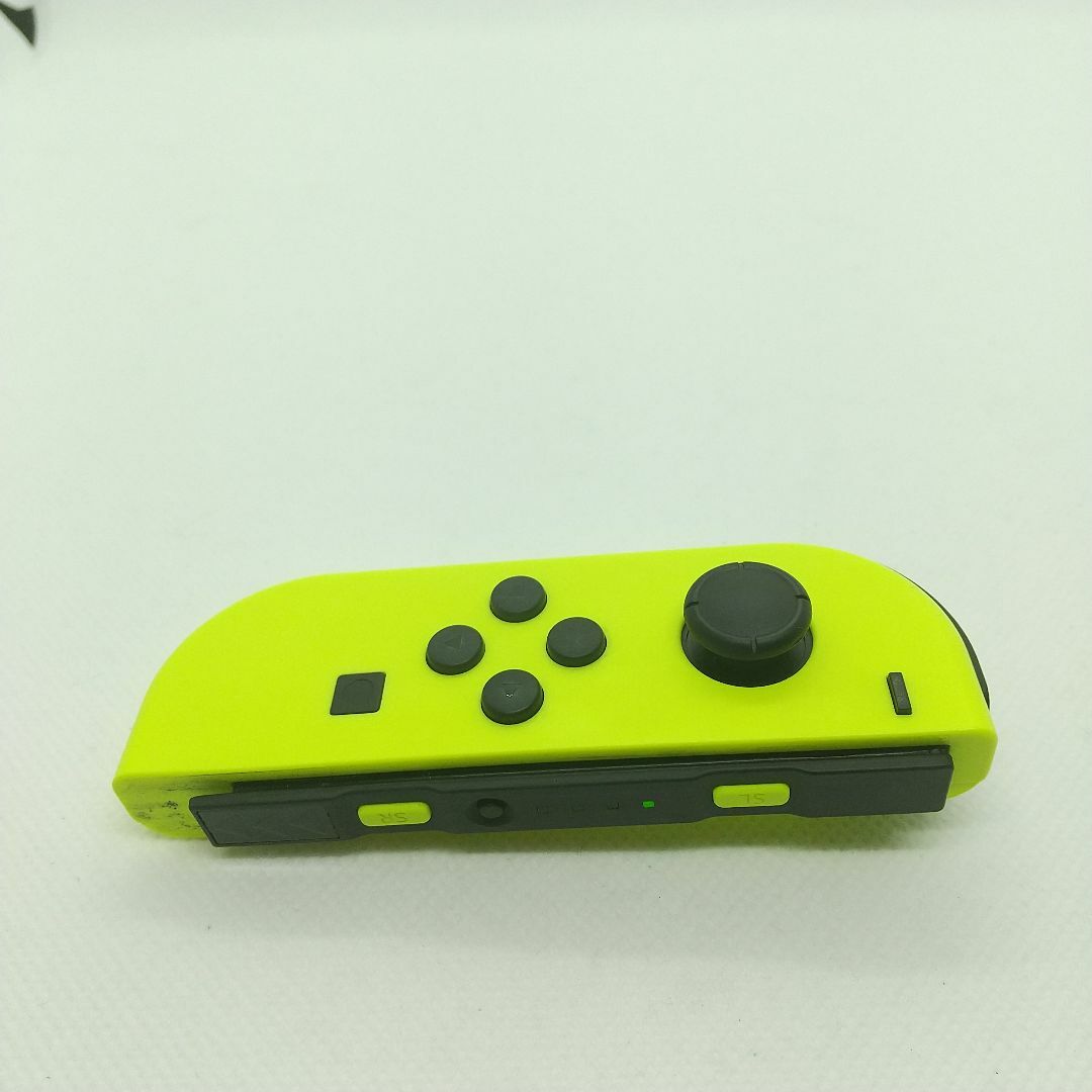 Nintendo Switch(ニンテンドースイッチ)の【希少】⑨Switch ジョイコン　ネオンイエロー左のみ(L)【任天堂純正品】黄 エンタメ/ホビーのゲームソフト/ゲーム機本体(家庭用ゲーム機本体)の商品写真