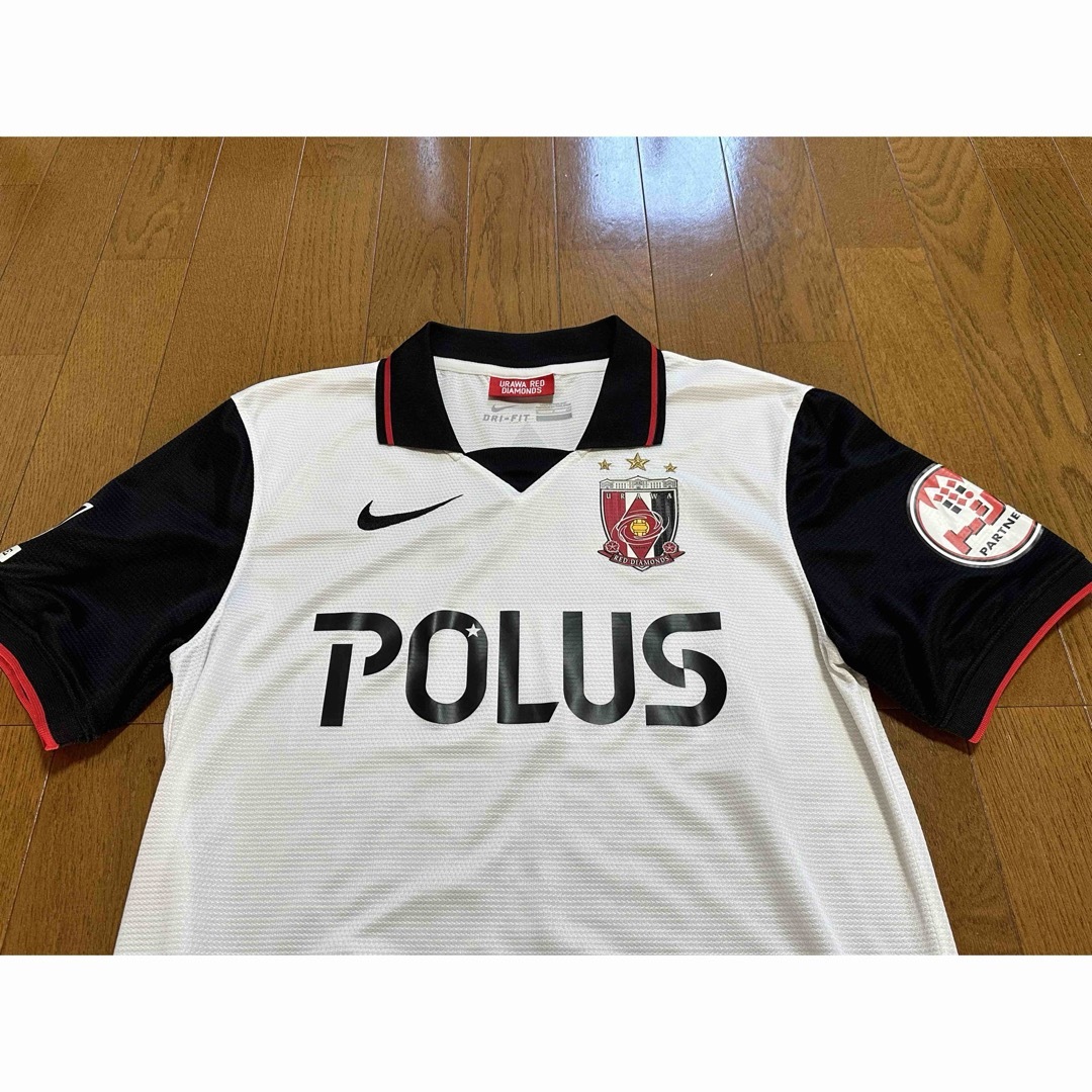 NIKE(ナイキ)の浦和レッズユニフォームAway2014/美品 スポーツ/アウトドアのサッカー/フットサル(ウェア)の商品写真