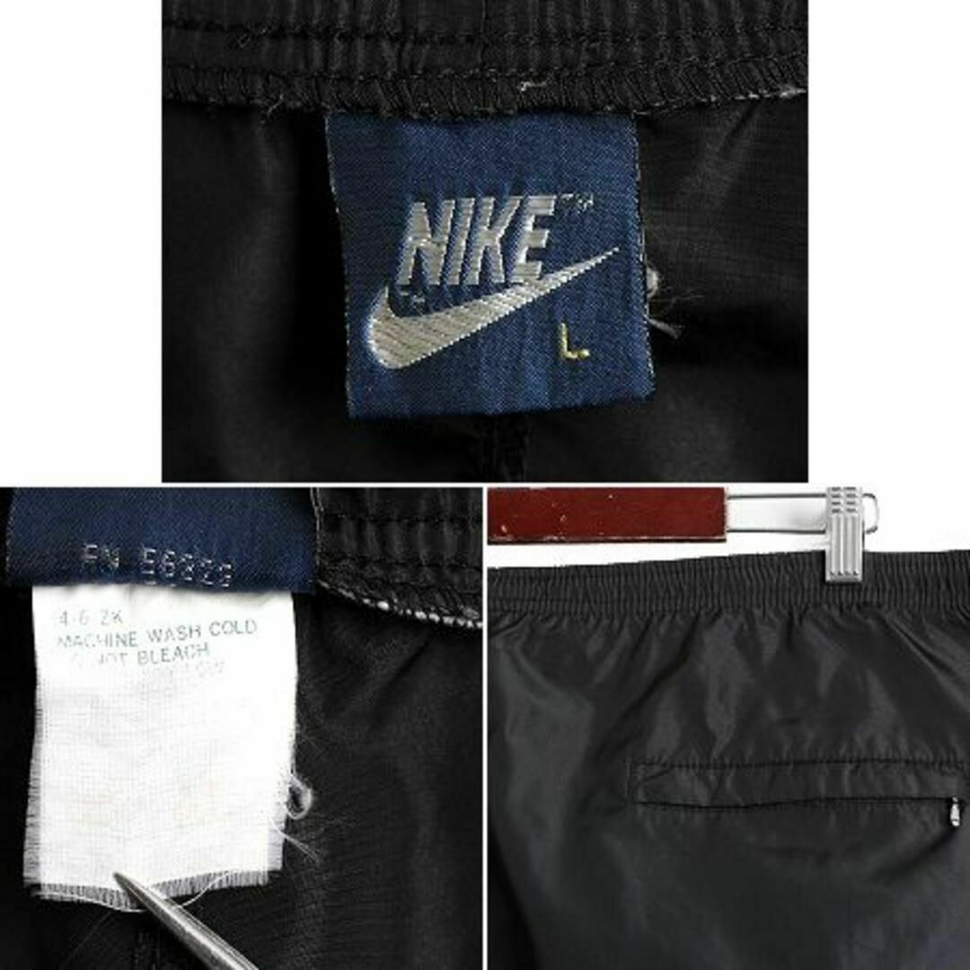 NIKE(ナイキ)の80s 紺タグ ビンテージ ナイキ ナイロン パンツ L 黒 スウォッシュ 薄手 メンズのパンツ(その他)の商品写真