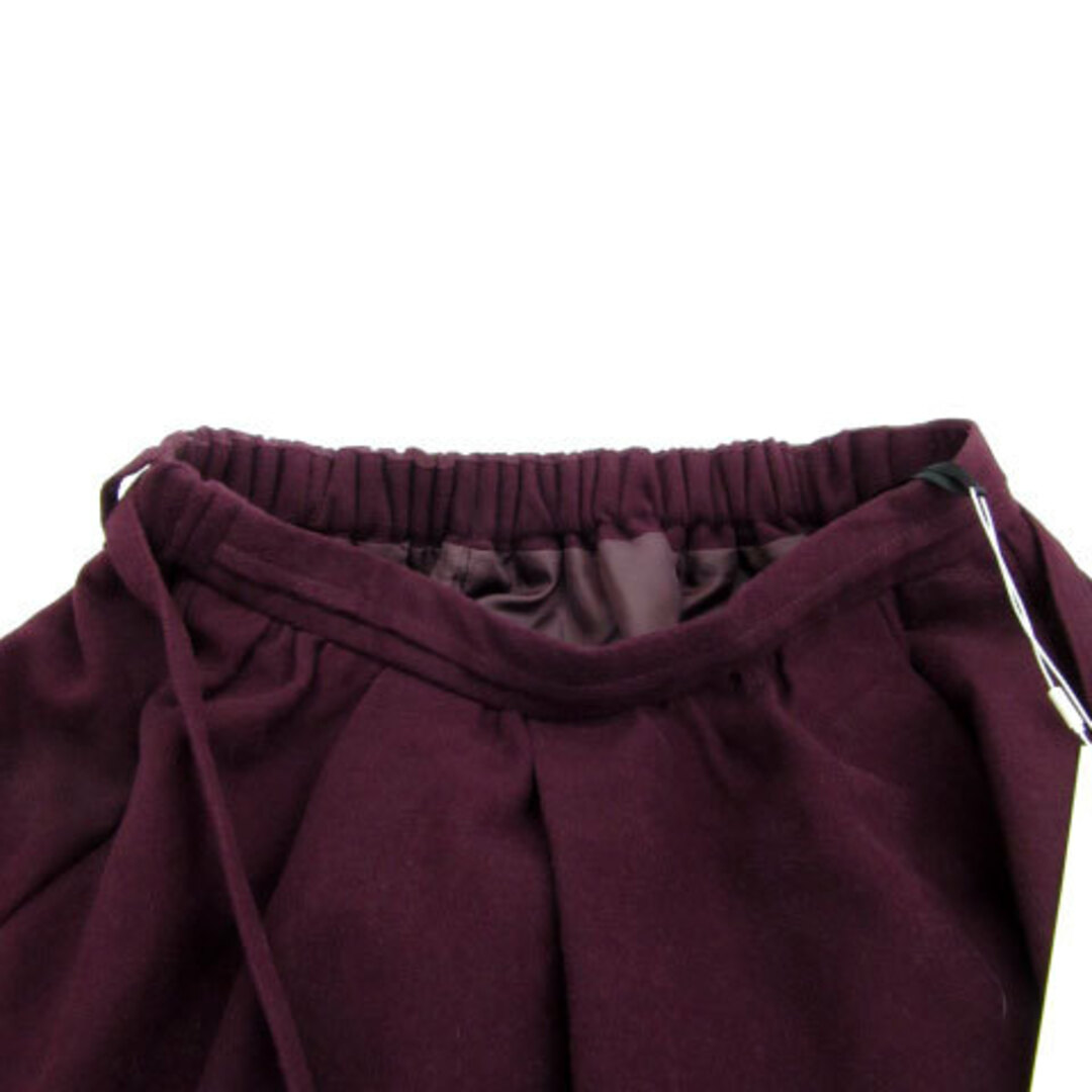 Discoat(ディスコート)のディスコート フレアスカート ミモレ丈 ベルト付き M ワインレッド レディースのスカート(ひざ丈スカート)の商品写真