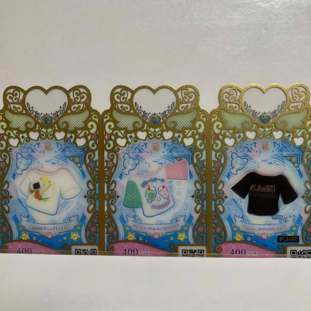 T-ARTS(タカラトミーアーツ)のプリマジ　Ｔシャツ　はるのピクニック　クリームソーダVSいちごミルク　リカ エンタメ/ホビーのトレーディングカード(その他)の商品写真