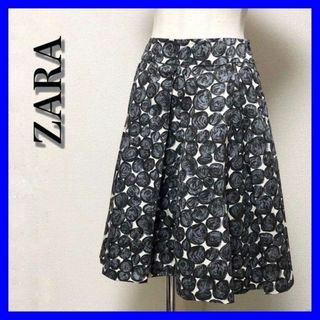 ザラ(ZARA)のザラ インバーテッドプリーツスカート アート柄 ブラック Mサイズ スペイン製(ひざ丈スカート)