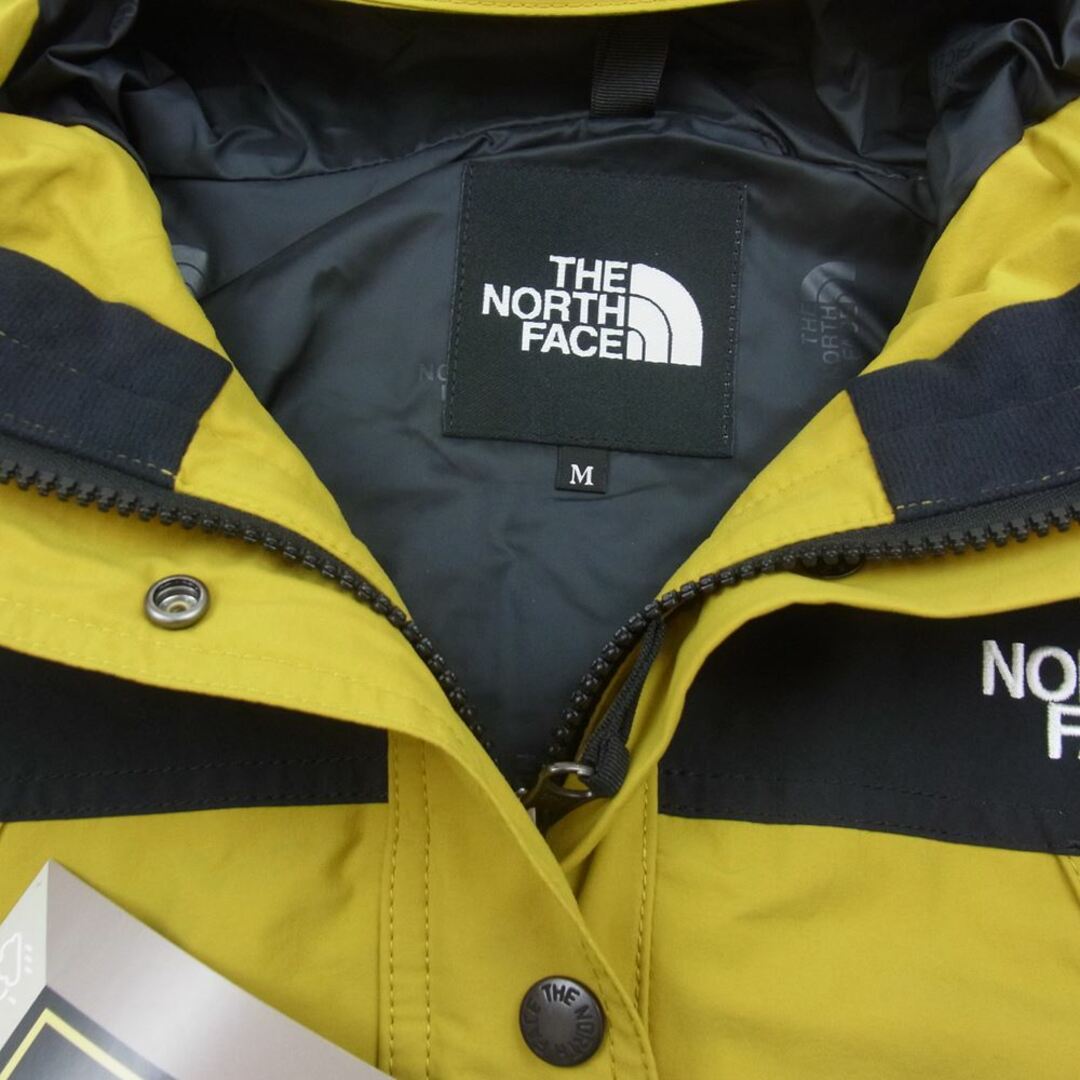 THE NORTH FACE(ザノースフェイス)のTHE NORTH FACE ノースフェイス NPW62236 Mountain Light Jacket マウンテン ライト ジャケット ミネラルゴールド M【新古品】【未使用】【中古】 メンズのジャケット/アウター(その他)の商品写真