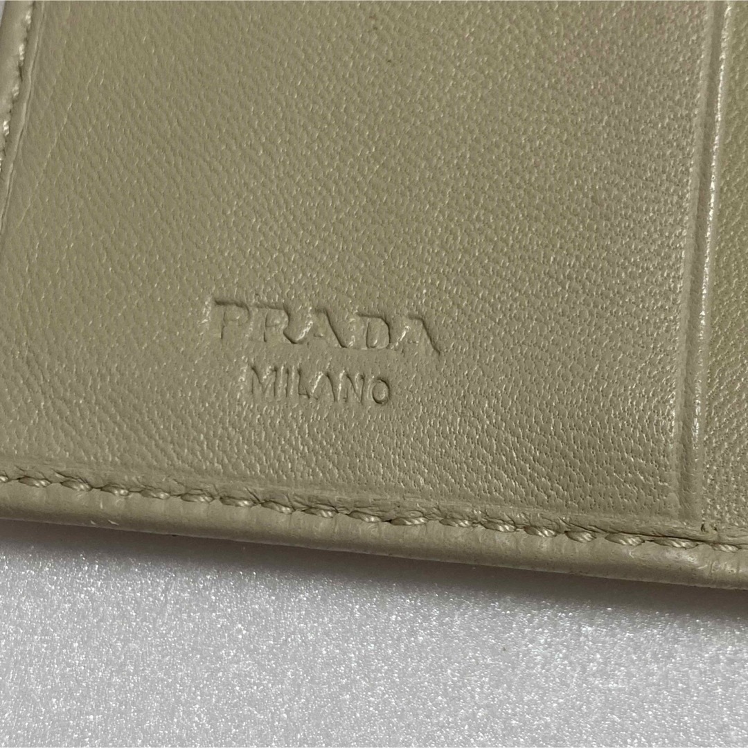 PRADA プラダ 折り財布 ターンロック 本革 ベージュ 4