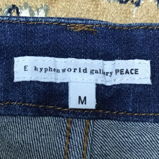 E hyphen world gallery(イーハイフンワールドギャラリー)のE hyphen world gallery PEACE ダメージジーンズ レディースのパンツ(デニム/ジーンズ)の商品写真