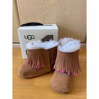 アグ(UGG)の【新品未使用】UGG ベビーファーストシューズムートンフリンジピンクブーツ(その他)