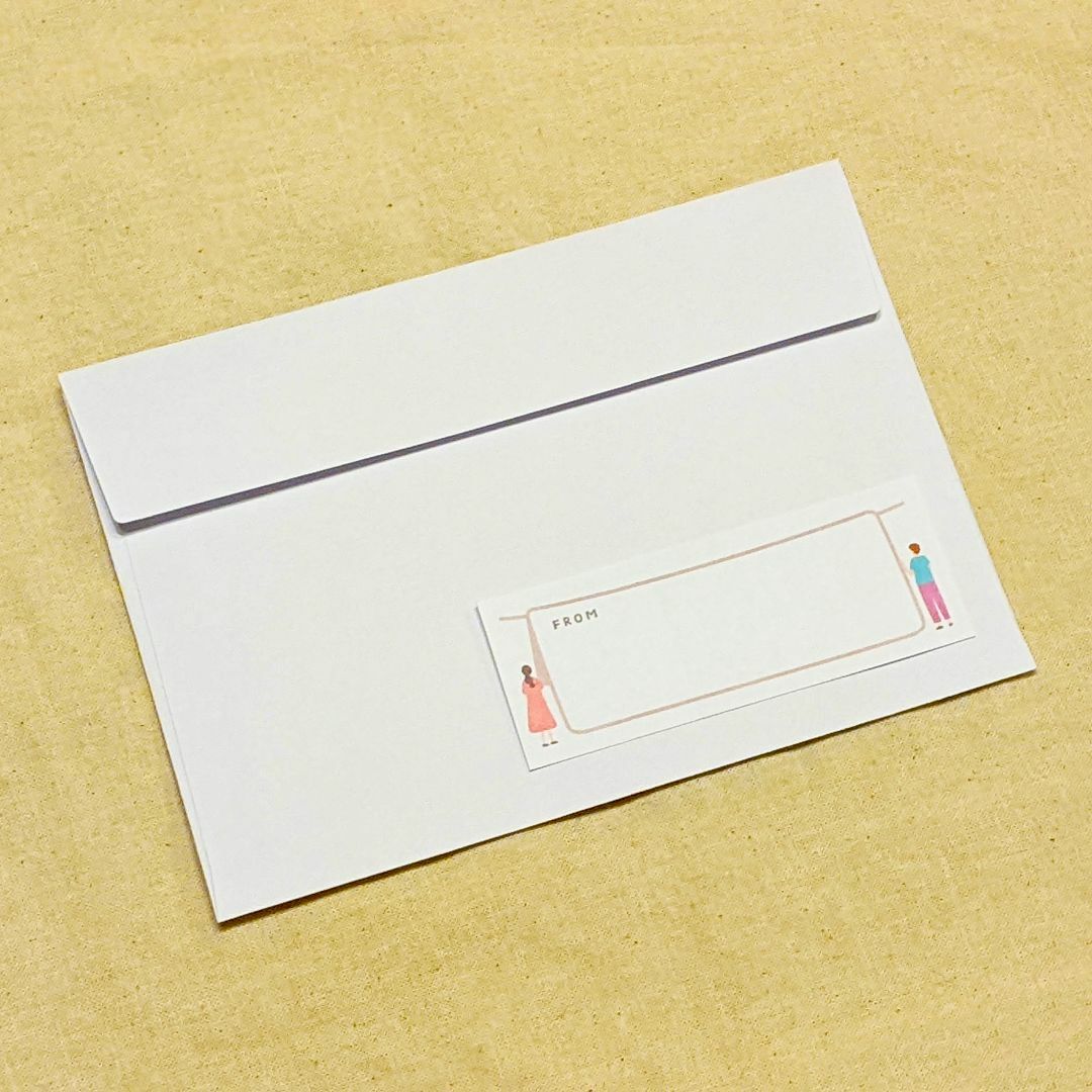切手アート封筒 〜洗濯物〜 ハンドメイドの文具/ステーショナリー(カード/レター/ラッピング)の商品写真