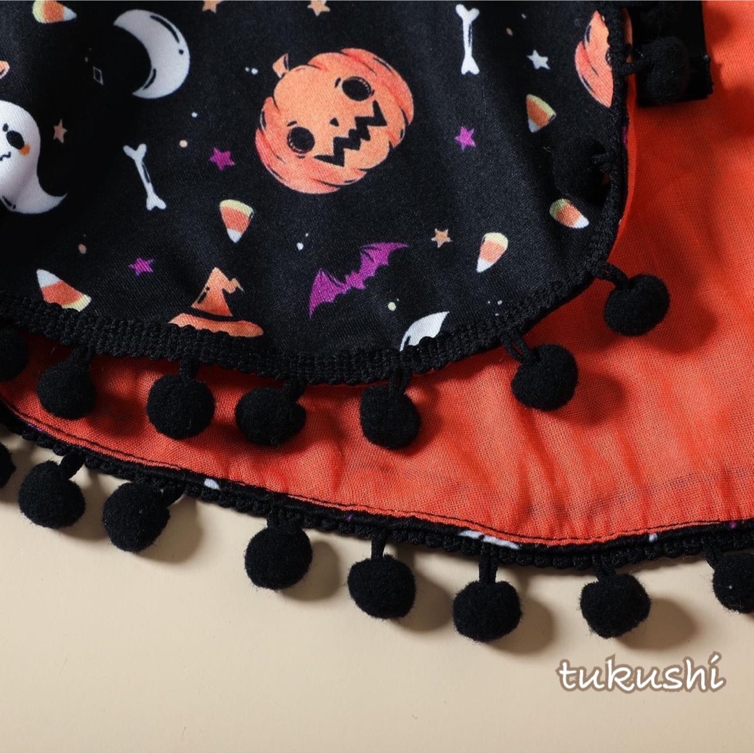 キッズハロウィンコス　ハロウィンマントワンピース　110サイズ　オレンジ　可愛い キッズ/ベビー/マタニティのキッズ服女の子用(90cm~)(ワンピース)の商品写真