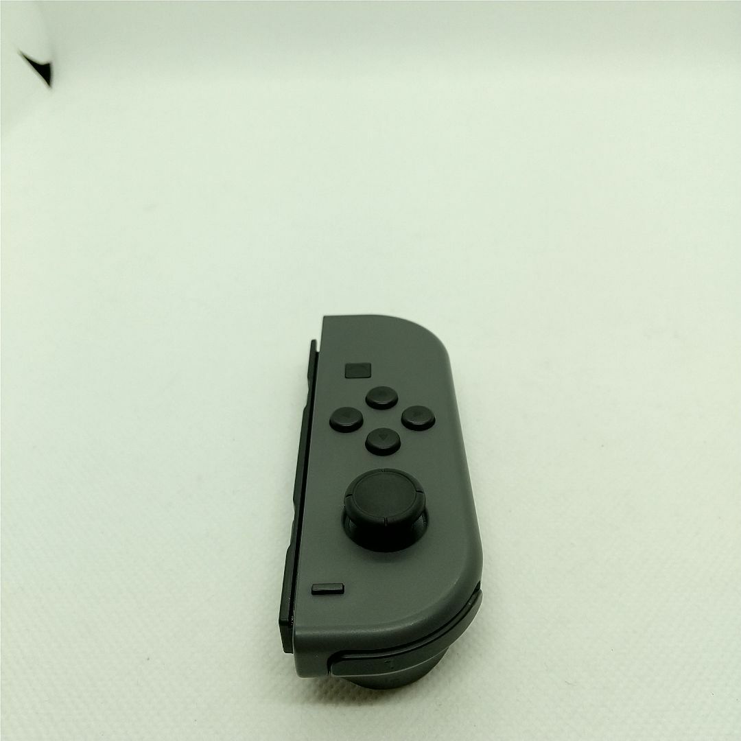 Nintendo Switch(ニンテンドースイッチ)の【廃盤】①Switch ジョイコン　グレー　左のみ(L)【任天堂純正品】灰色黒色 エンタメ/ホビーのゲームソフト/ゲーム機本体(家庭用ゲーム機本体)の商品写真