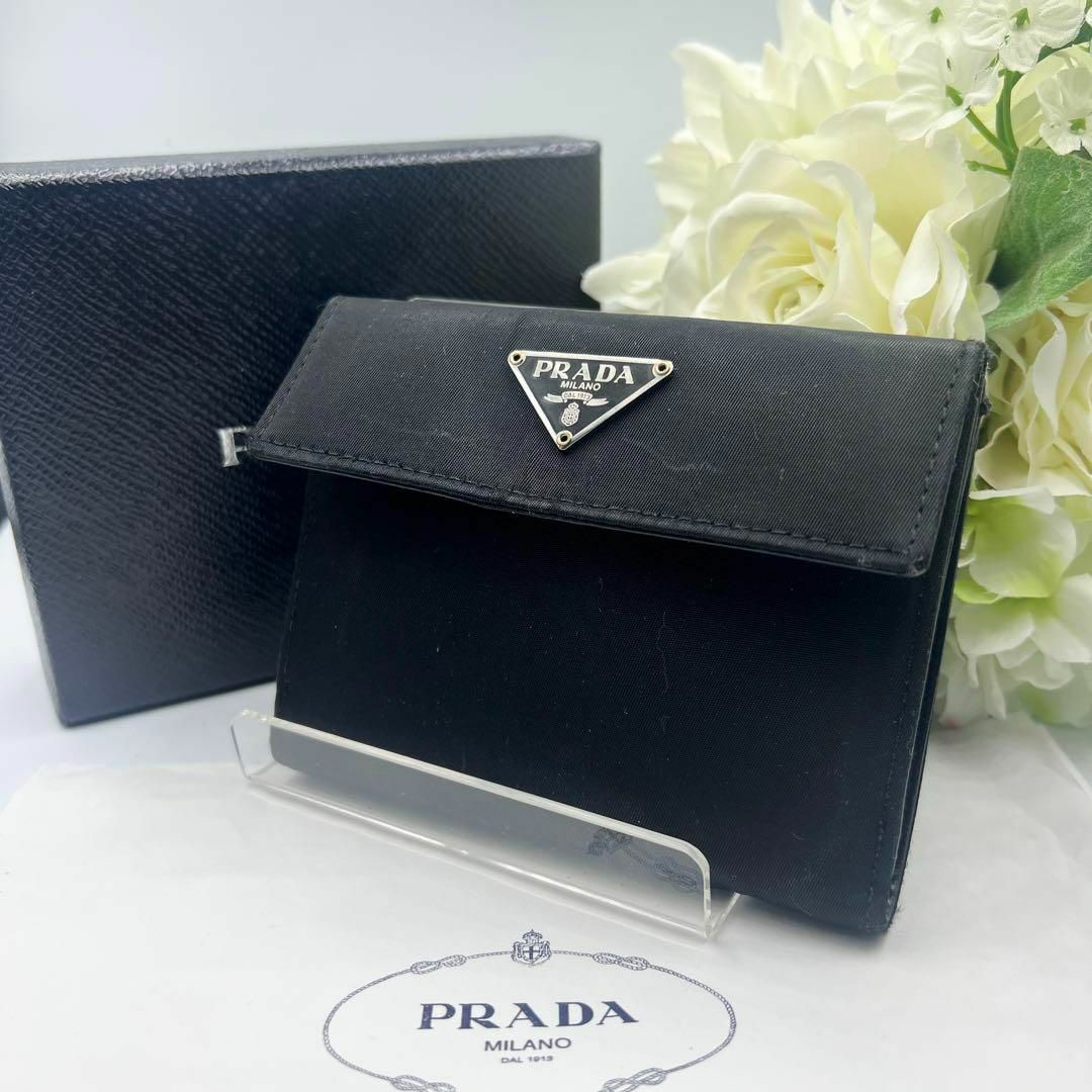 PRADA - PRADA プラダ 三角ロゴ 二つ折り財布 ナイロン ブラック 黒の ...