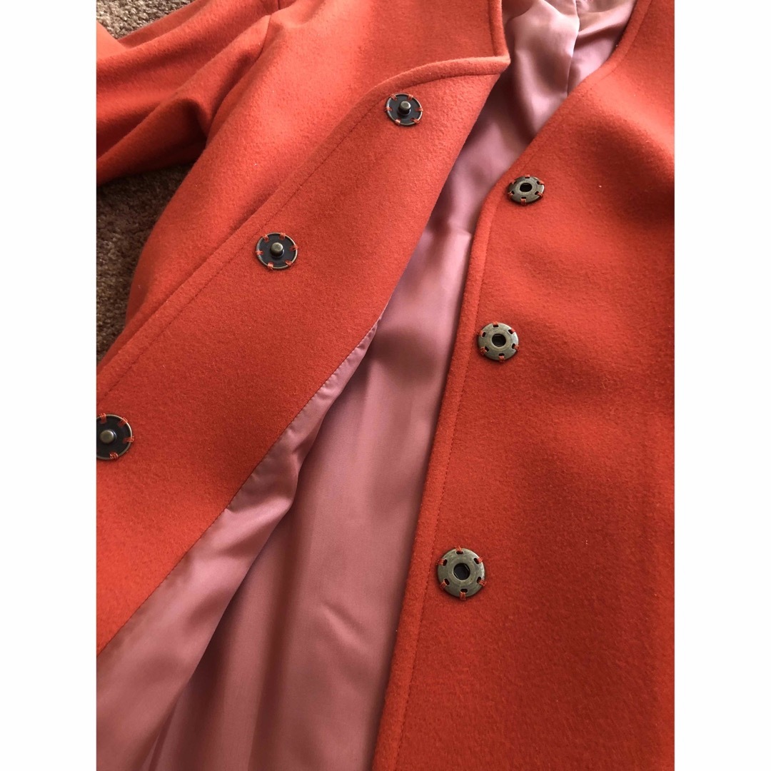 PARIGOT(パリゴ)のパリゴ　ノーカラーコート　オレンジ　サイズフリー レディースのジャケット/アウター(ロングコート)の商品写真