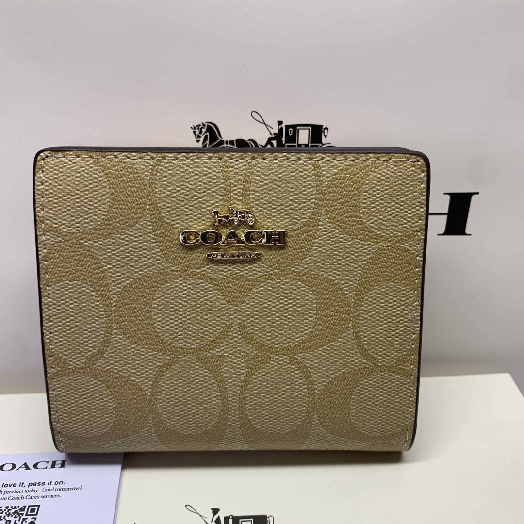 コーチ　COACH 二つ折り財布　コンパクト　ライトカーキ　ピンク C3309