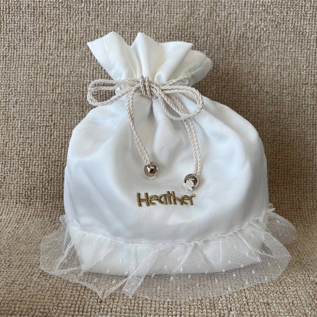 heather(ヘザー)の【新品】Heather.ホワイト巾着 レディースのファッション小物(ポーチ)の商品写真