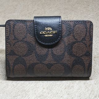 コーチ(COACH)の新品！コーチ二つ折り財布シグネチャー　ブラウン(財布)