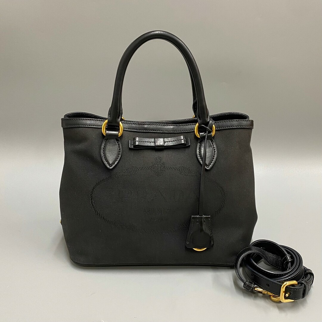 PRADA - 美品 希少品 PRADA プラダ 三角 ロゴ 金具 キャンバス レザー