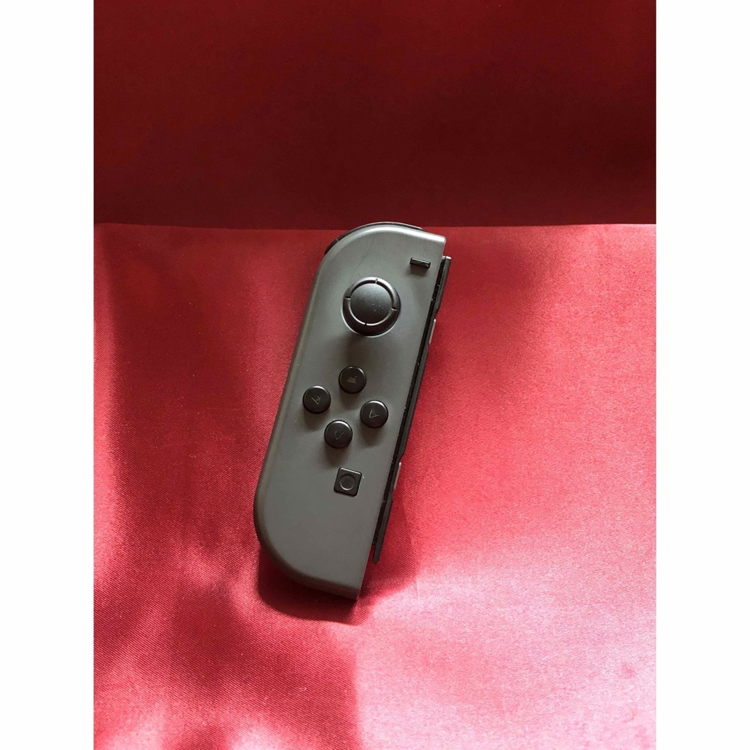 Nintendo Switch(ニンテンドースイッチ)の[安心保証]状態良品　純正ジョイコン　グレー Ｌ エンタメ/ホビーのゲームソフト/ゲーム機本体(その他)の商品写真