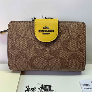 コーチ(COACH) 財布(レディース)(イエロー/黄色系)の通販 300点以上
