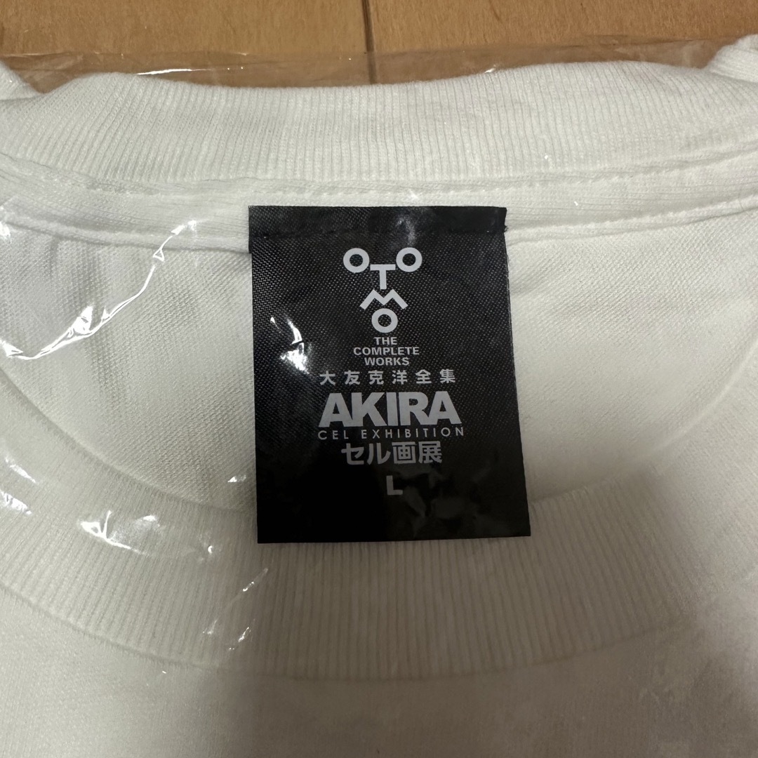 AKIRA PRODUCTS(アキラプロダクツ)の送料込　Lサイズ　大友克洋全集 AKIRAセル画展　大友全集Tシャツ エンタメ/ホビーの漫画(青年漫画)の商品写真